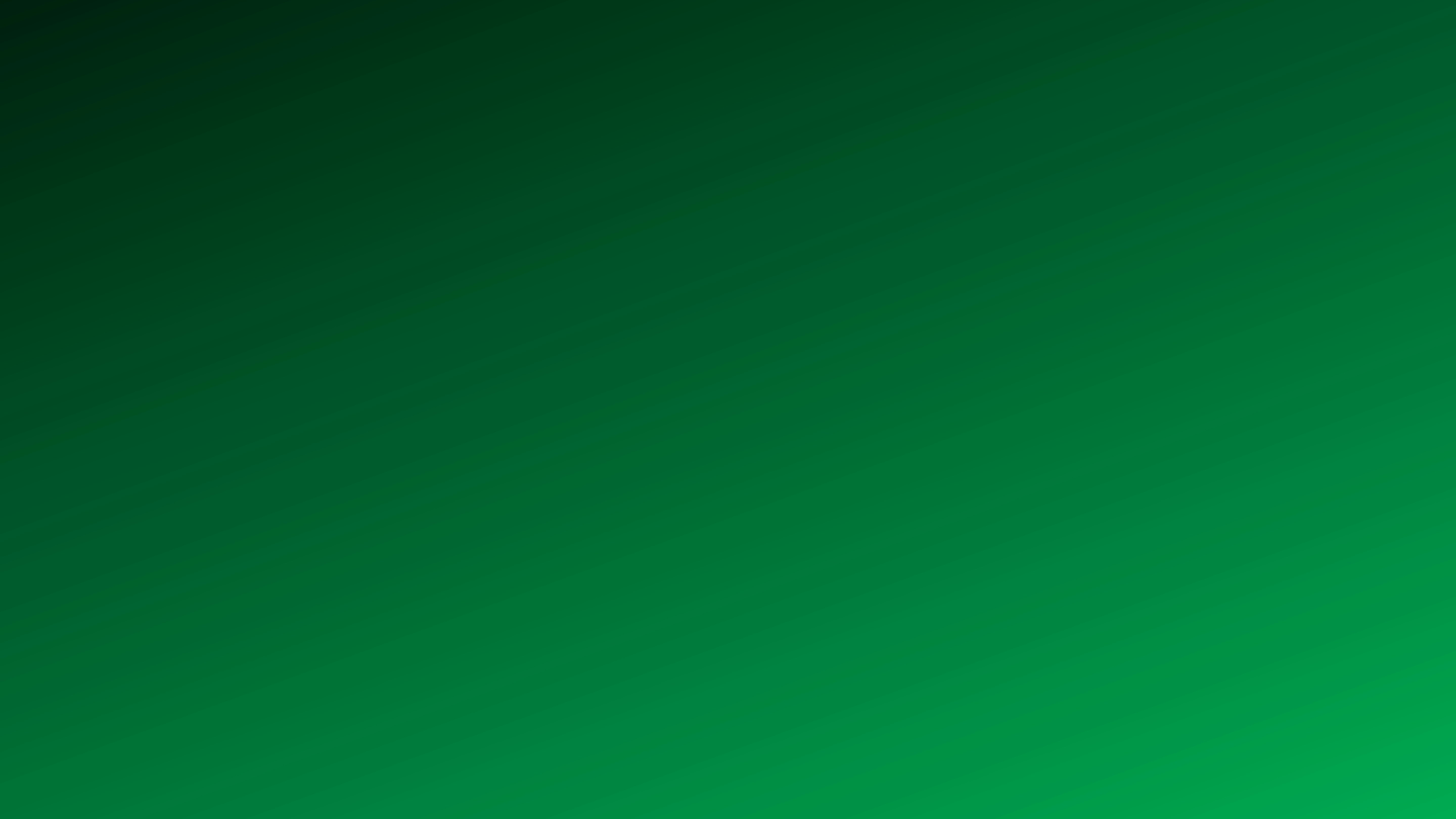 A smooth gradient shifting from dark forest green to bright emerald green